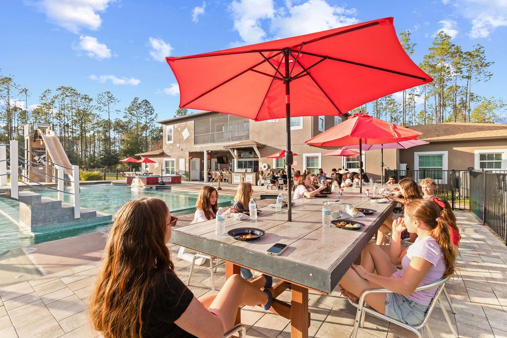 Poolside dinning under the umbrellas