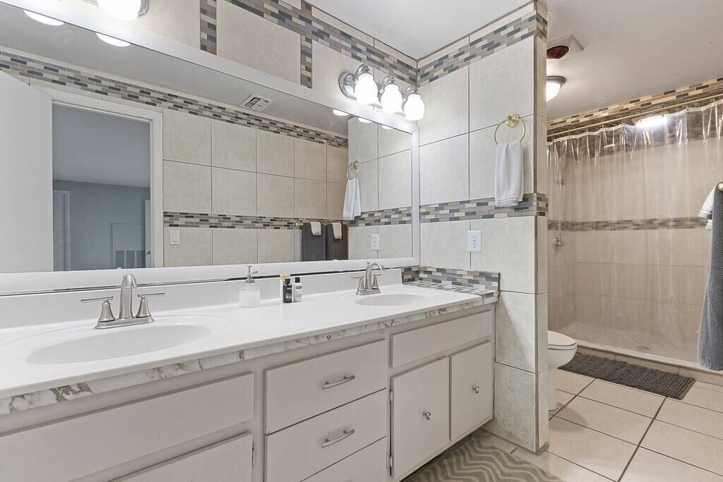 Master bathroom with his and her sinks.