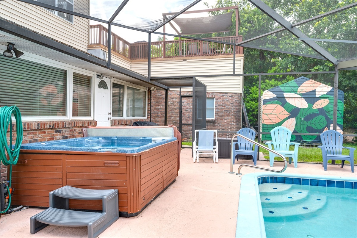Stay warm year round in the poolside hot tub.