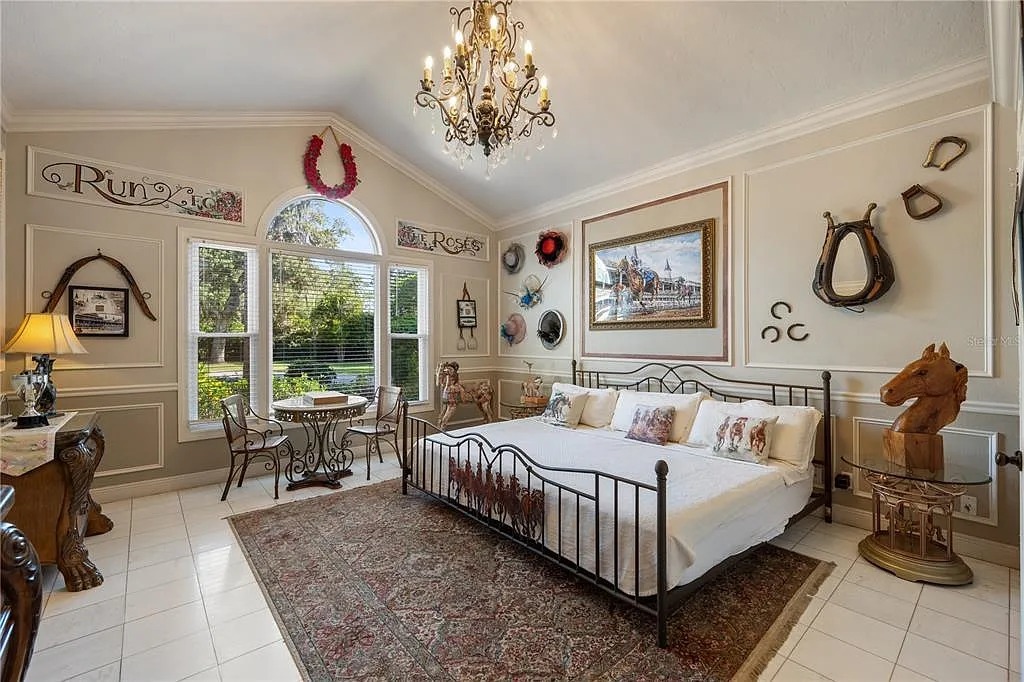 Our elegant bedroom filled with natural light and charm.