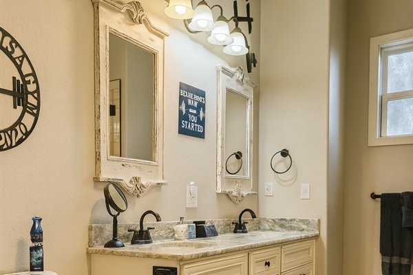 Double vanity bath with elegant lighting and plenty of space