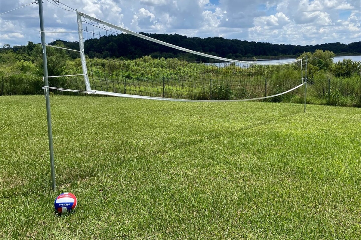 Serve and rally on our lakeside volleyball court, great for family fun and outdoor group games.