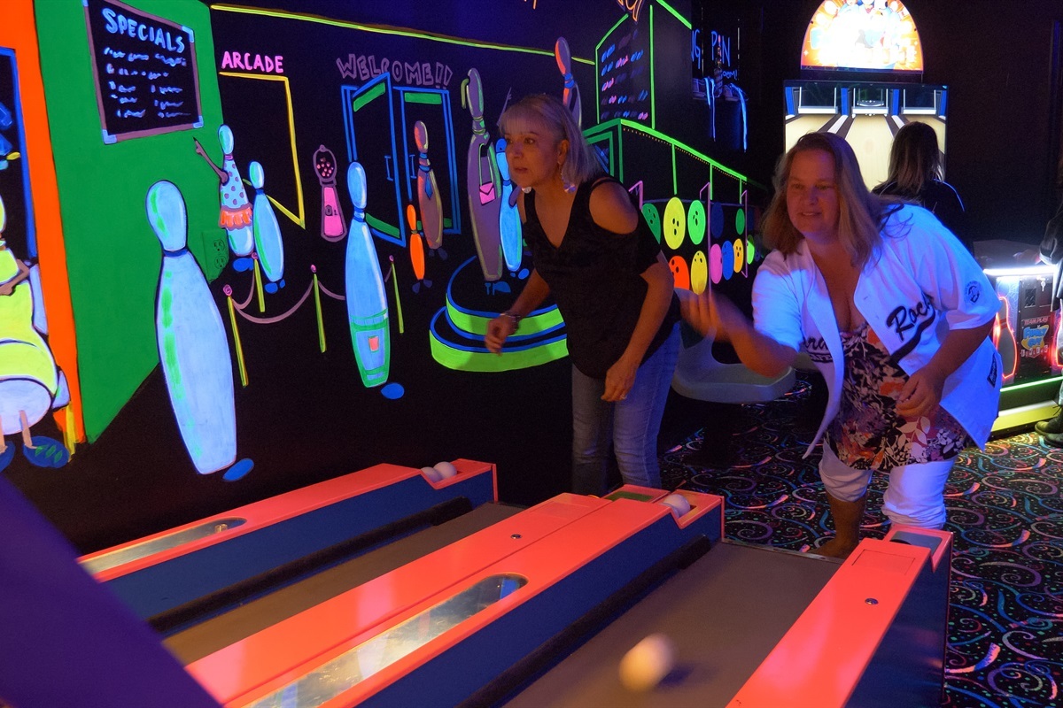 The glow-in-the-dark bowling alley is a hit for guests of all ages.