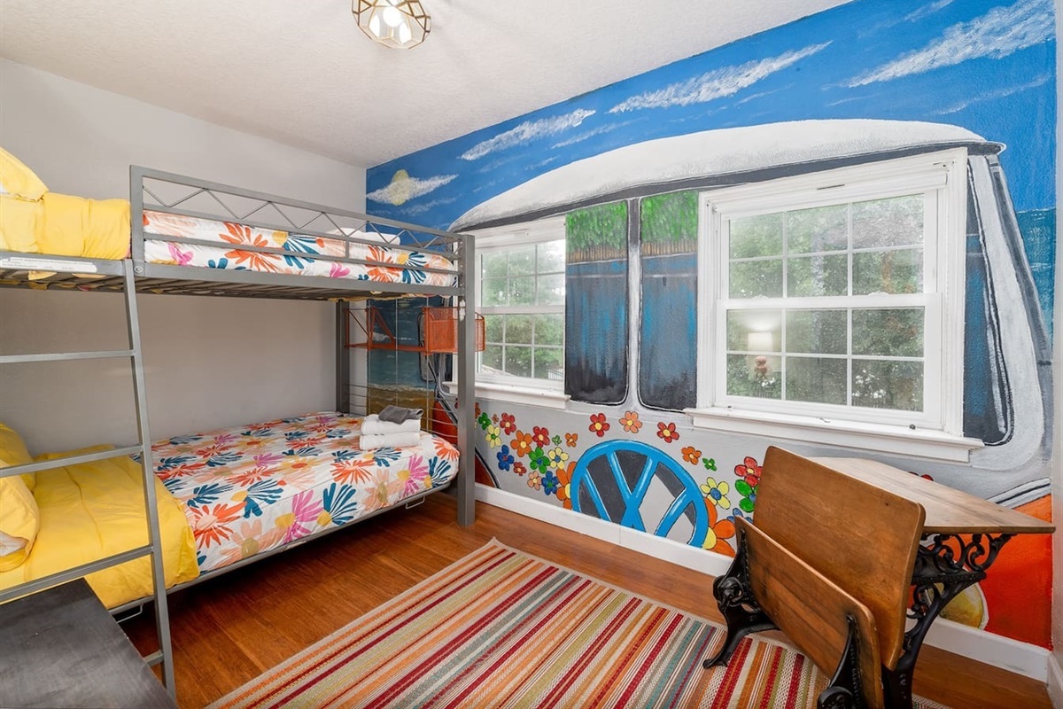 The 60s room: Two full-size bunk beds for up to 4 guests, sharing a bathroom with the 50s room.