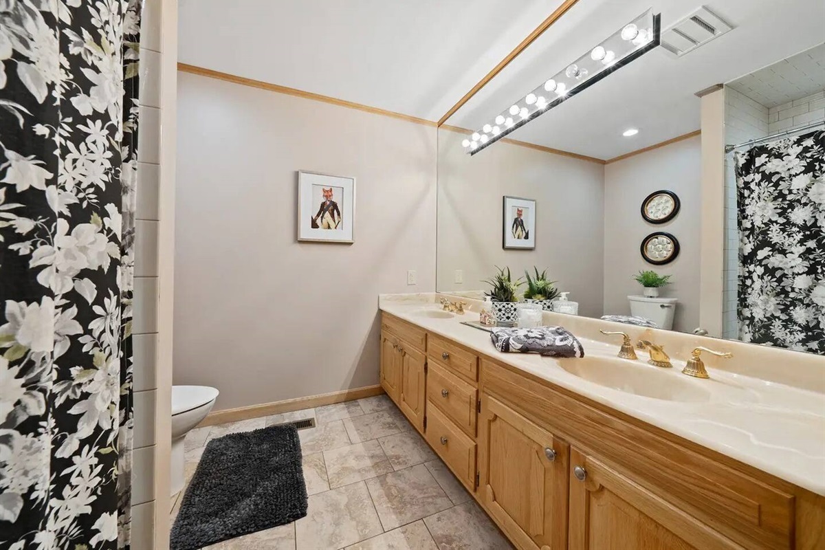 Shared downstairs full bath.