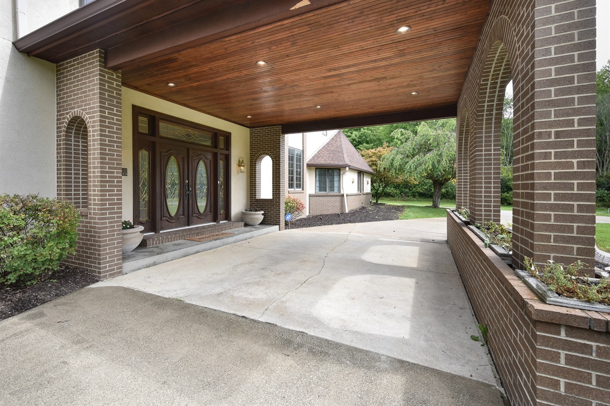 The entryway allows extra parking and easy drop off.