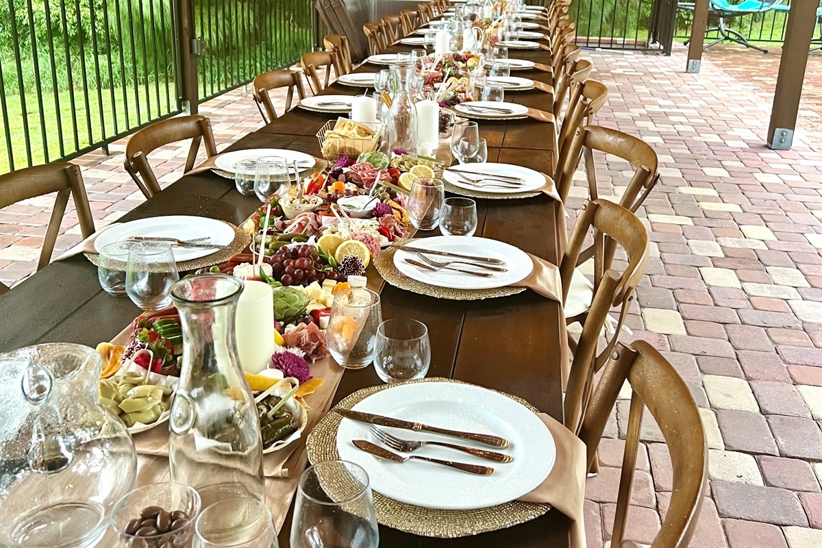 Gather poolside with lake views and long tables, ideal for celebrations, dinners, and special events.