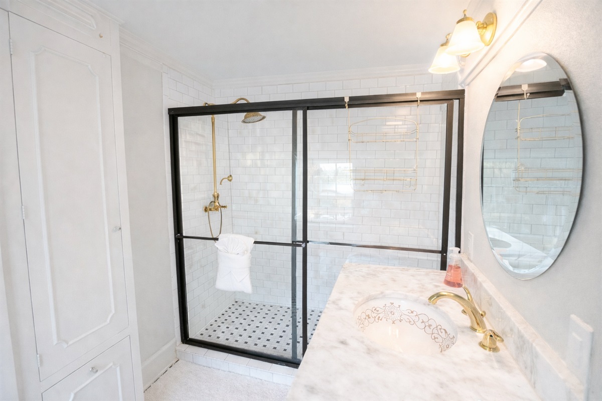 A stylish private en-suite bathroom connected to the Roaring 20s Room.