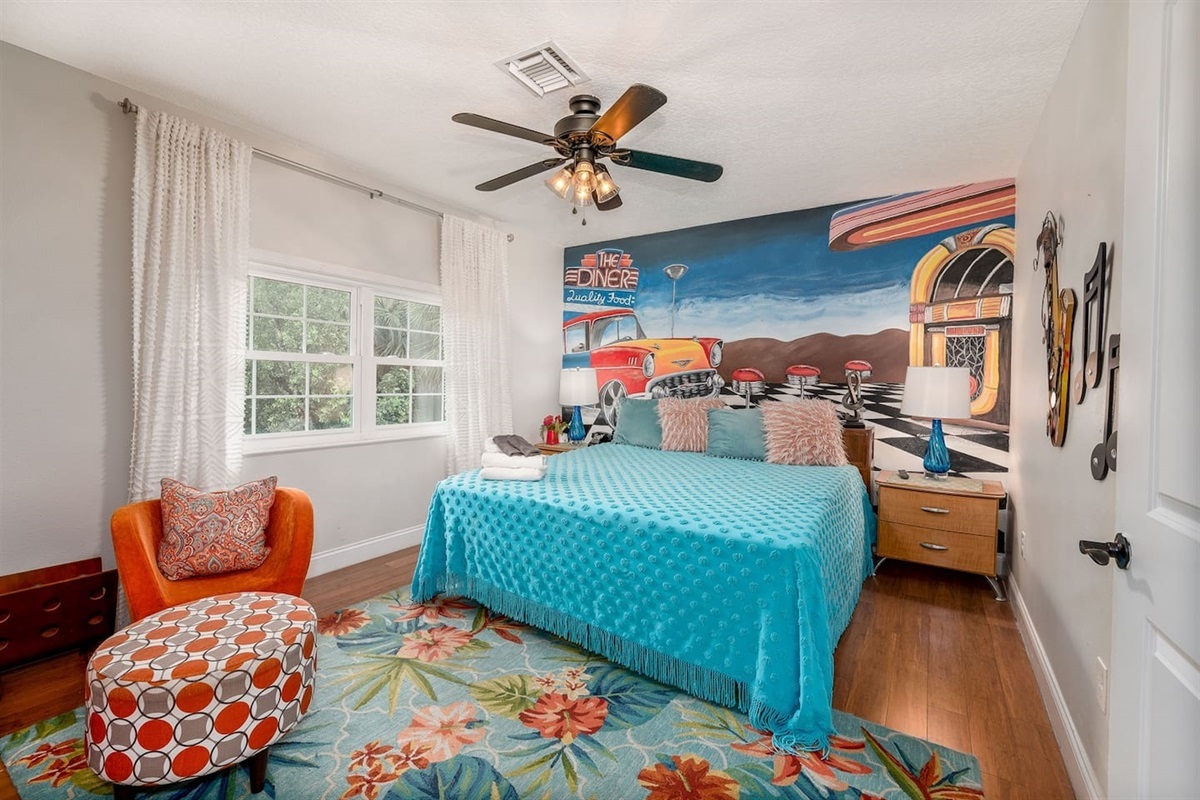 The 50s Room combines retro charm with stunning lake views for a memorable stay.