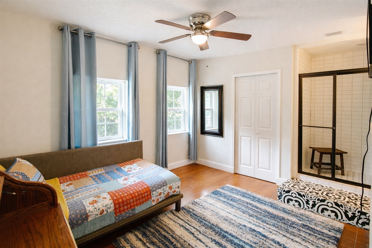 30s room has a fireplace, en-suite shower, sink and shares a toilet with the 50's room.