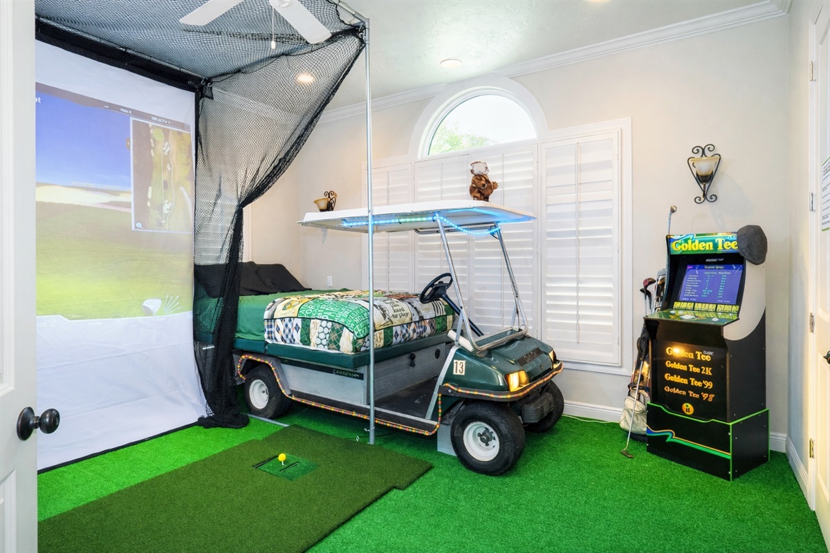 this golf cart room has its own golf simulator!