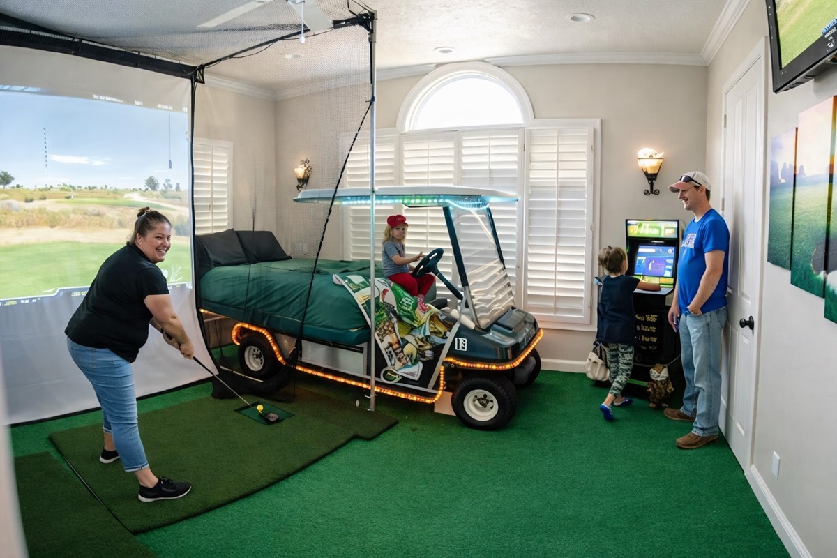 A golf simulator bedroom!