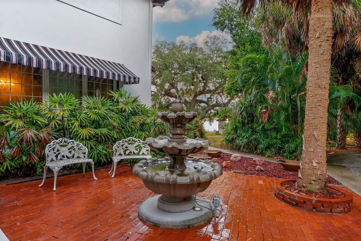 Unwind by the fountain and take in the serene outdoor setting.