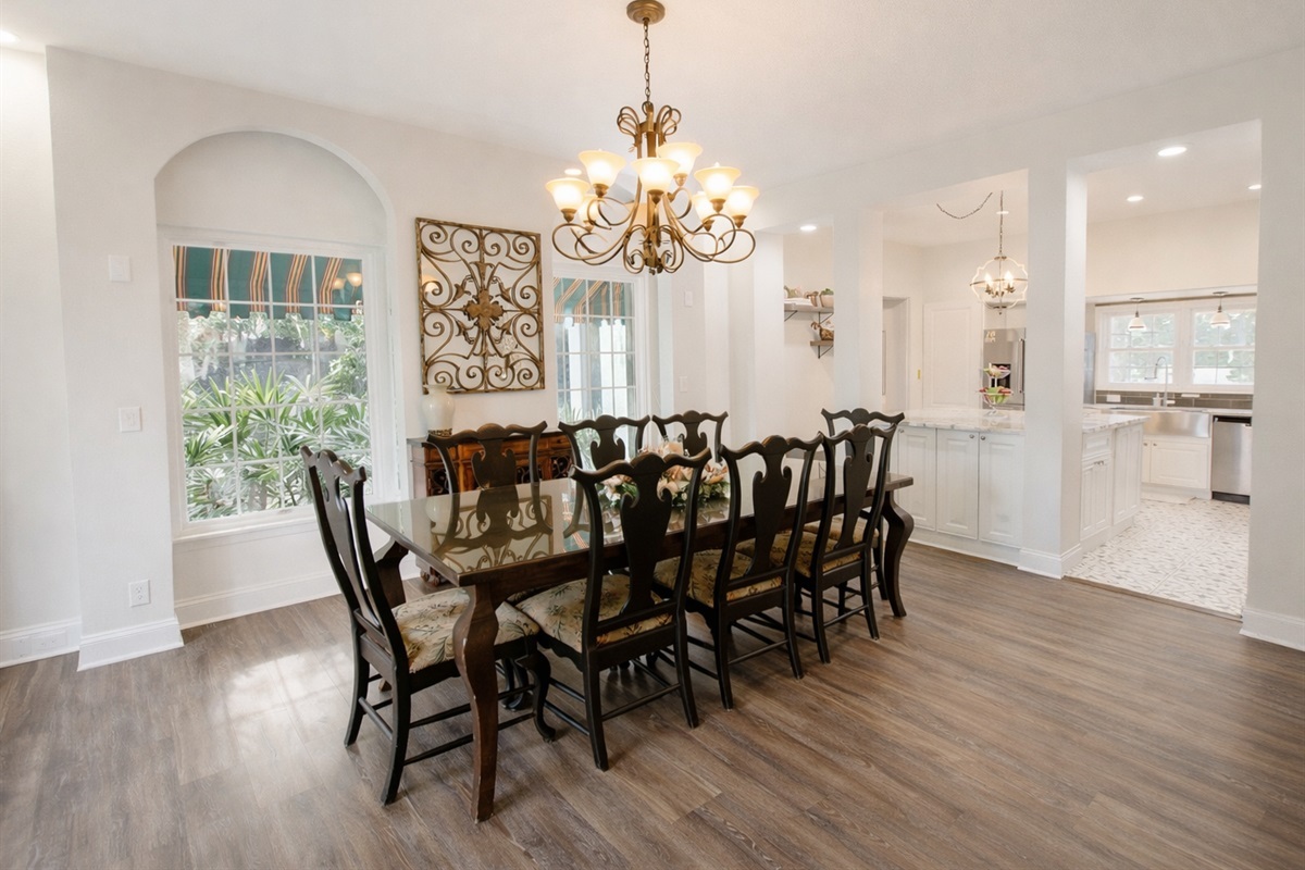 Gather around the elegant dining table that seats ten, ideal for celebrations and shared meals.
