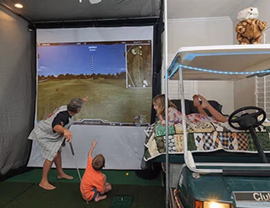 Golf Simulator Bedroom at Lake Louisa Chateau — Orlando vacation rental