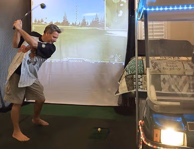 Golf Simulator Bedroom at Lake Louisa Chateau — Orlando vacation rental