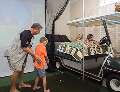 Golf Simulator Bedroom at Lake Louisa Chateau — Orlando vacation rental